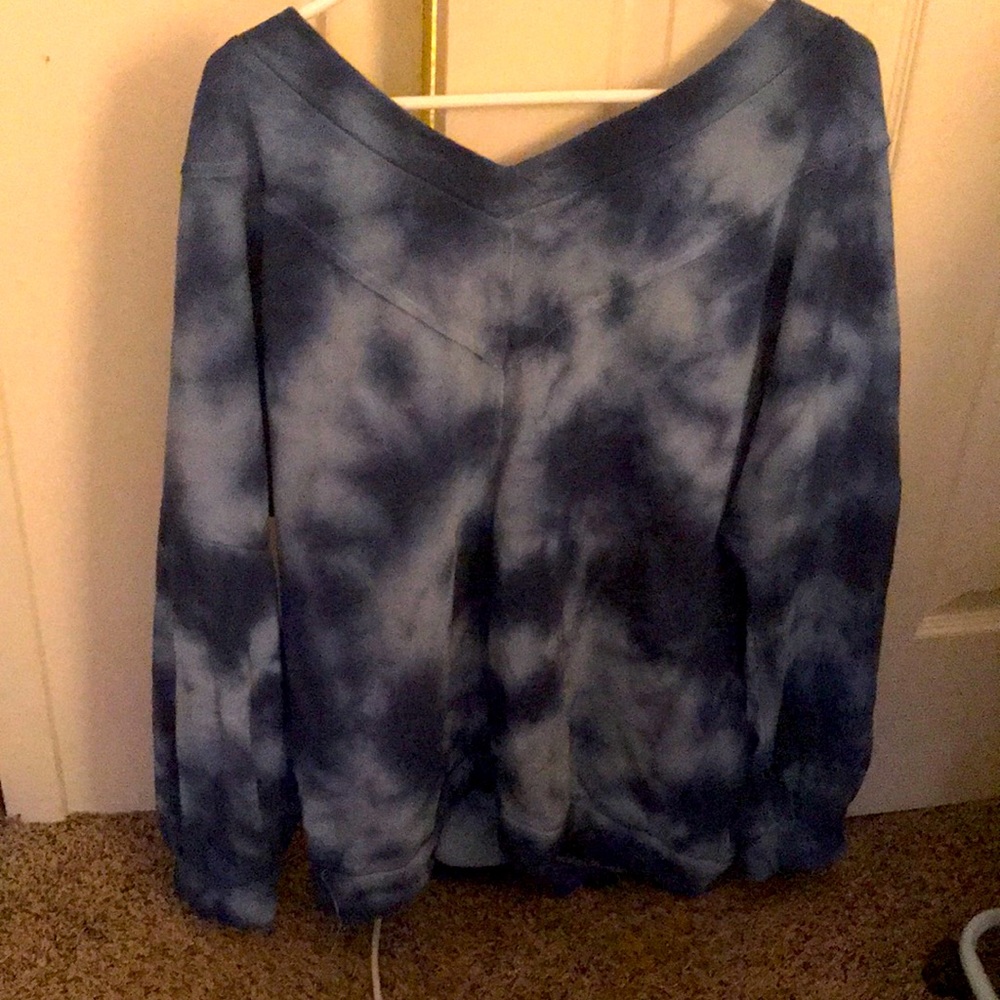 Blue tied dyed women’s sweater with cut out back v-neck